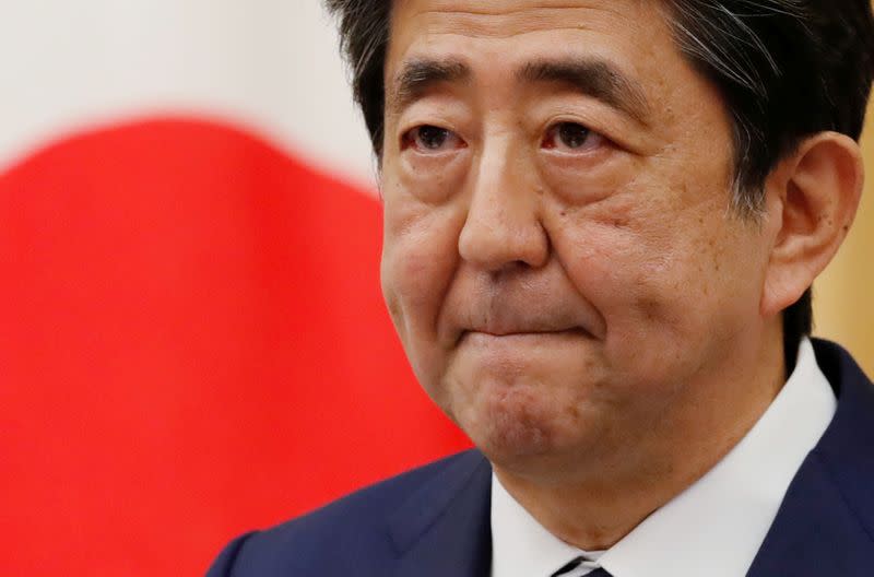 FILE PHOTO: Japan's Prime Minister Shinzo Abe holds a news conference in Tokyo