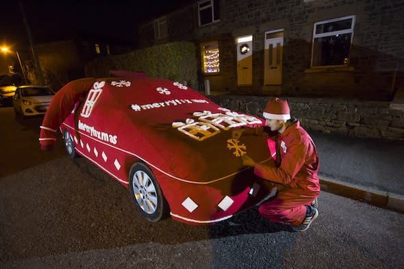 EDITORIAL USE ONLYOne of Direct Lineâ€™s #merryfixmas team covers the Ibbetson family car with a specially designed â€˜Christmas jumperâ€™ to highlight the problems caused by cold weather in car breakdowns during the festive season, in New Mills, Derbyshire. PRESS ASSOCIATION Photo. Picture date: Monday December 21, 2015. Direct Line has compiled the list of Twelve â€˜Dismaysâ€™ of Christmas as part of their #merryfixmas campaign, in response to new research, which has revealed nine out of ten people aged 25-34 suffer from â€˜Advent Anxietyâ€™ â€“ festive-based stress. Photo credit should read: Jon Super/PA Wire