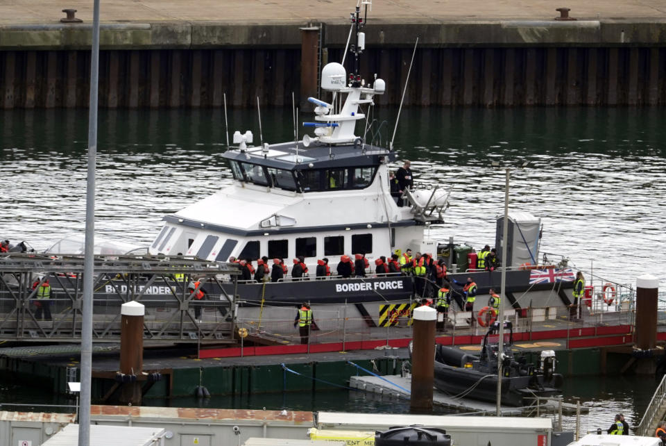 A group of people thought to be migrants are brought in to Dover, Kent, by the Border Force following a small boat incident in the Channel, on Tuesday April 23, 2024. Prime Minister Rishi Sunak said "nothing will stand in our way" of getting flights to Rwanda off the ground, as the Government braced itself for legal challenges to the scheme to send asylum seekers to the east African country. (Gareth Fuller/PA via AP)