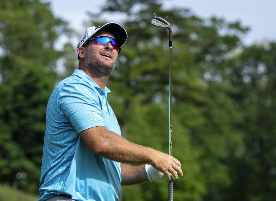 Ryan Fox, of New Zealand, watches his approach shot on the eighth hole during the third round of Canadian Open golf tournament in Hamilton, Ontario, Saturday, June 1, 2024. (Frank Gunn/The Canadian Press via AP)