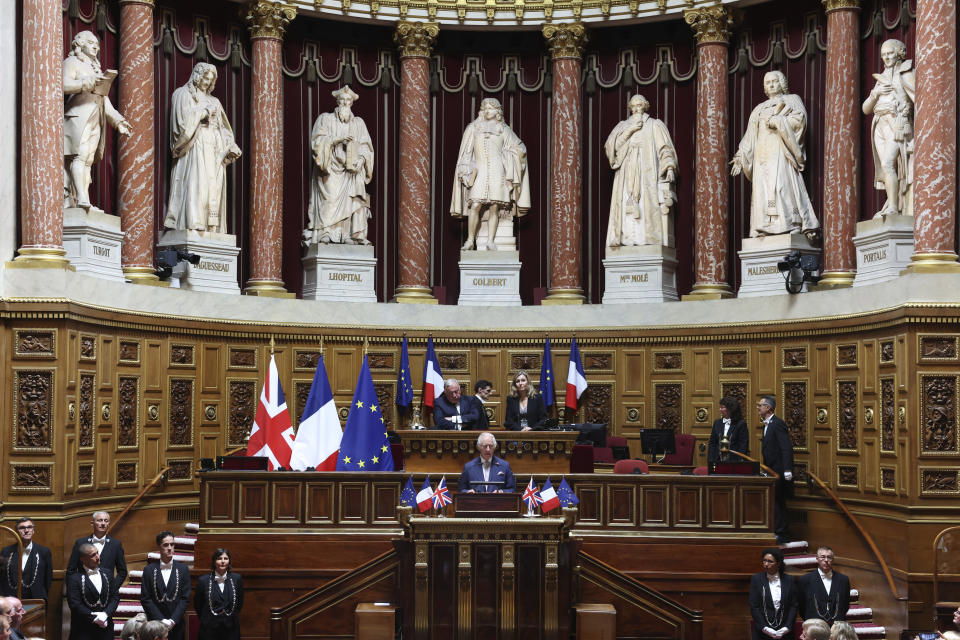 Britain's King Charles III addresses French lawmakers from both the upper and the lower house of parliament, at the French Senate Thursday, Sept. 21, 2023 in Paris. King Charles III will later meet with sports groups in the northern suburbs of Paris and pay a visit to fire-damaged Notre-Dame cathedral Thursday, on the second day of his state visit to France.( Emmanuel Dunand, Pool via AP)
