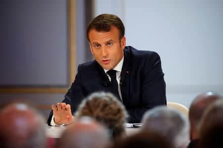 French President Emmanuel Macron speaks during a news conference to unveil his policy response to the yellow vests protest, at the Elysee Palace in Paris, France, April 25, 2019. REUTERS/Philippe Wojazer