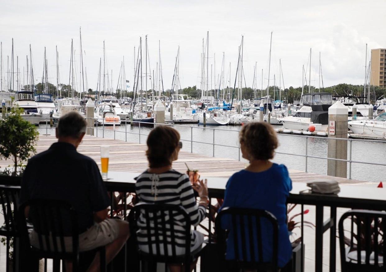 Customers enjoy harbor view at Mama Foo Foo, June 18, 2021.