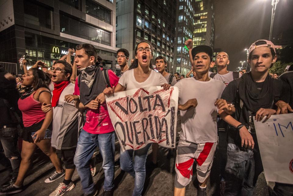 <p>Supporters of suspendend President Dilma Rousseff hold a demonstration during her impeachment trial, in Sao Paulo, Brazil on August 30, 2016. (Cris Faga/NurPhoto via Getty Images) </p>