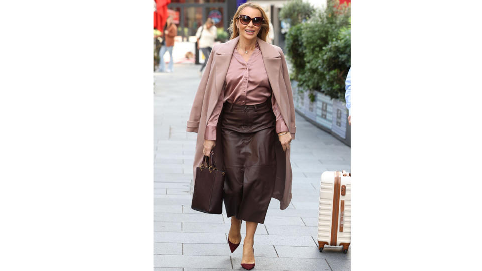 Amanda Holden in a brown midi skirt outfit