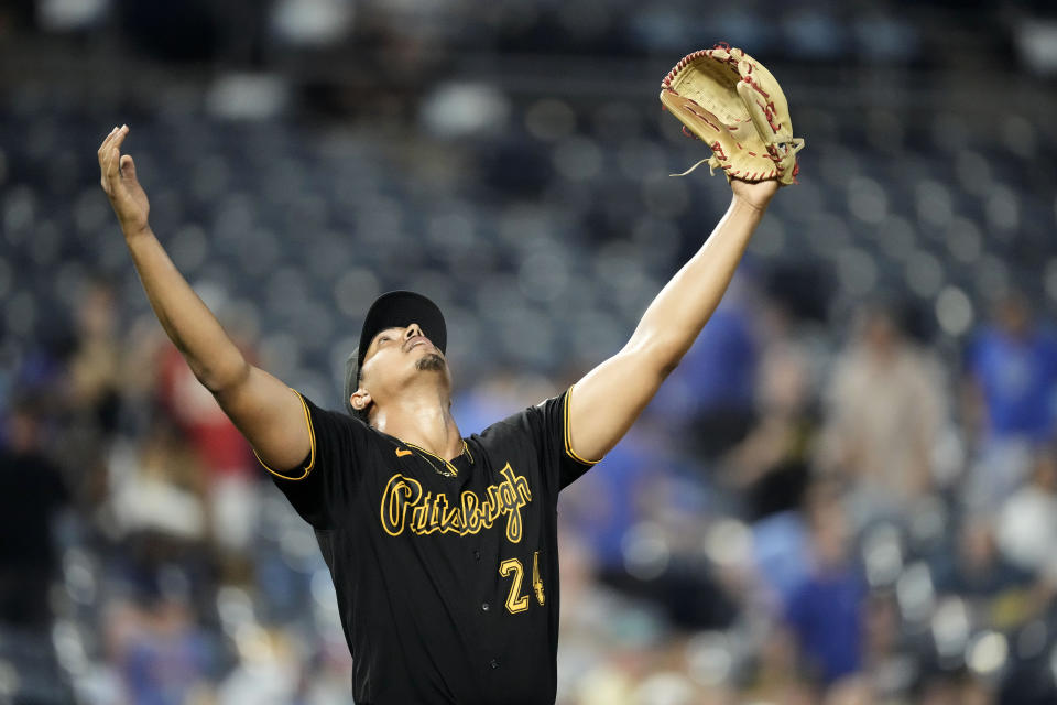 Pittsburgh Pirates starting pitcher Johan Oviedo celebrates after a baseball game against the Kansas City Royals Monday, Aug. 28, 2023, in Kansas City, Mo. Oviedo pitched a complete game leading the Pirates to a 5-0 win. (AP Photo/Charlie Riedel)