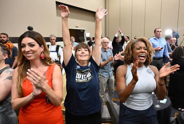 Calley Malloy, left, Cassie Woolworth and Dawn Rattan applauded the failure of a ballot initiative on Aug. 2, 2022, that would have taken away abortion rights in Kansas. (Photo: Tammy Ljungblad/Kansas City Star/Tribune News Service via Getty Images)