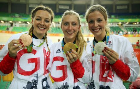 2016 Rio Olympics - Cycling Track - Victory Ceremony - Women's Sprint Victory Ceremony - Rio Olympic Velodrome - Rio de Janeiro, Brazil - 16/08/2016. Silver medalist Rebecca James (GBR) of Britain, bronze medalist Katy Marchant (GBR) of Britain, and women's omnium gold medalist Laura Trott (GBR) of Britain pose with their medals. REUTERS/Matthew Childs