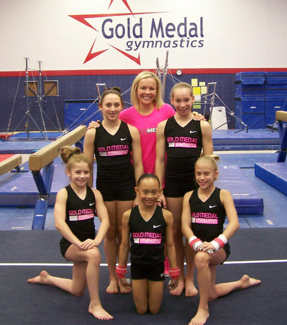 Borden is the owner and a coach at Gold Medal Gym in Tempe, Ariz., which she opened in 2004. She later opened another branch in nearby Chandler. Borden has served as a commentator for both gymnastics and cheerleading events on CBS Sports, Fox Sports, Turner Broadcasting and ESPN. She has two children with husband Brad Cochran. (Photo courtesy of Gold Medal Gym/Sue Kern-Fleischer)