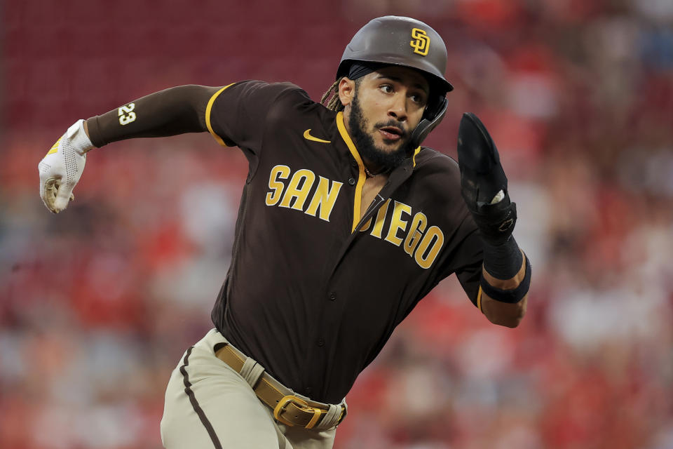 San Diego Padres' Fernando Tatis Jr. runs the bases and scores a run during the first inning of a baseball game against the Cincinnati Reds in Cincinnati, Tuesday, June 29, 2021. (AP Photo/Aaron Doster)