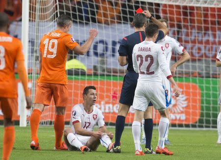 Marek Suchy of Czech Republic (17) receives a red card during their match against Netherlands during their Euro 2016 group A qualifying soccer match in Amsterdam, Netherlands October 13, 2015. REUTERS/Toussaint Kluiters/United Photos