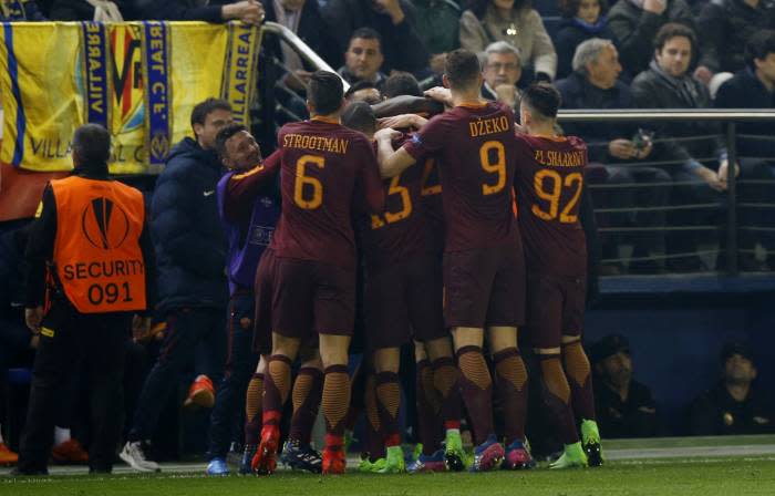 Roma celebrate another goal in their 4-0 win