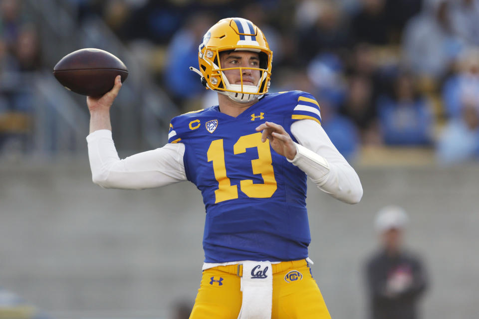 FILE - California quarterback Jack Plummer (13) passes against UCLA during the first half of an NCAA college football game in Berkeley, Calif., Friday, Nov. 25, 2022. Plummer, who transferred to Cal from Purdue last December, is now at Louisville. (AP Photo/Jed Jacobsohn, File)
