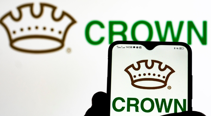 In this photo illustration Crown Holdings, Inc. (CCK) logo seen displayed on a smartphone in the background.