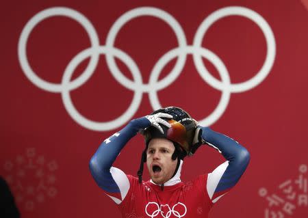 Skeleton – Pyeongchang 2018 Winter Olympics – Men’s Training – Olympic Sliding Centre - Pyeongchang, South Korea – February 13, 2018 - John Daly of the U.S. prepares. REUTERS/Edgar Su