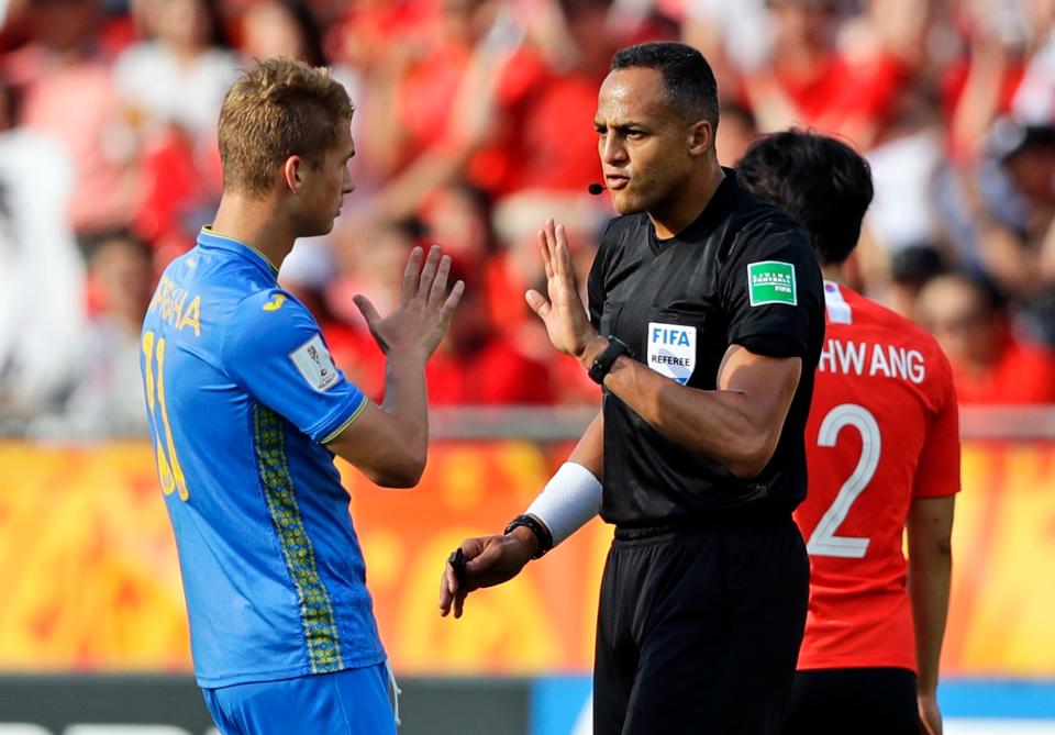 Austin's Ismail Elfath, right, will become only the eighth American to work as a soccer referee at the World Cup.