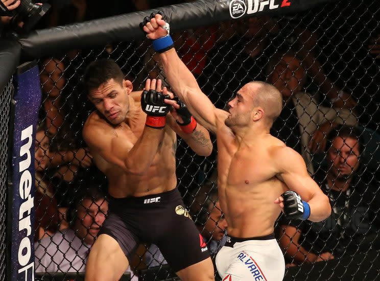 Eddie Alvarez punches Rafael Dos Anjos during their UFC Fight Night card. (Getty)