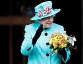 <p>Queen Elizabeth II waves to onlookers as she leaves the Easter Sunday service at St George’s Chapel at Windsor Castle in Berkshire (PA Archive) </p>