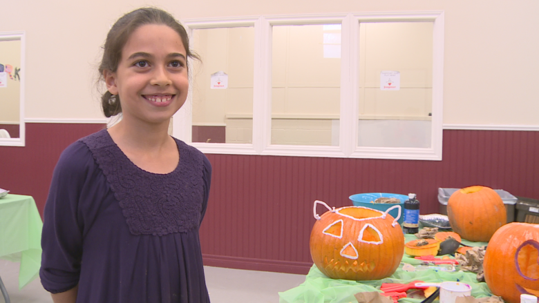 Boys and Girls Club welcomes newcomers to pumpkin-carving event