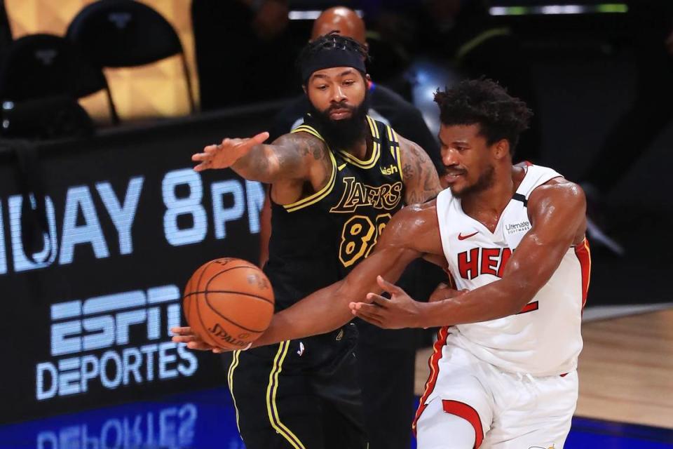 Markieff Morris #88 of the Los Angeles Lakers defends Jimmy Butler #22 of the Miami Heat during the fourth quarter in Game 5 of the 2020 NBA Finals at AdventHealth Arena at the ESPN Wide World Of Sports Complex on Oct. 9, 2020 in Lake Buena Vista.