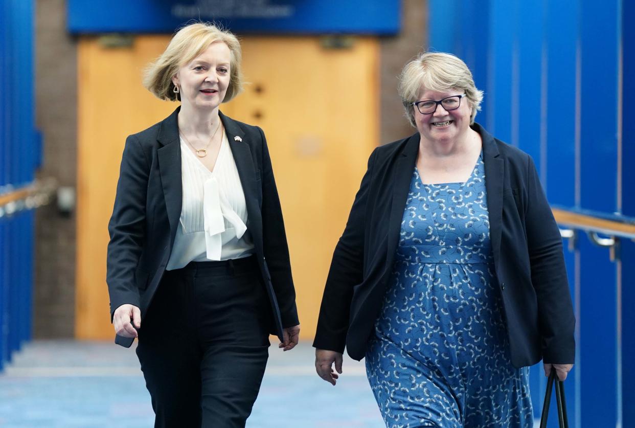 Prime Minister Liz Truss (left) and Deputy Prime Minister and Health Secretary Therese Coffey during the Conservative Party annual conference at the International Convention Centre in Birmingham. Picture date: Monday October 3, 2022.