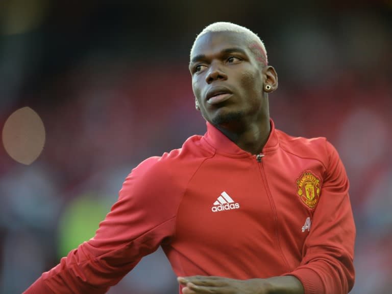 Manchester United set a new world record with the 89-million-pound purchase of French midfielder Paul Pogba