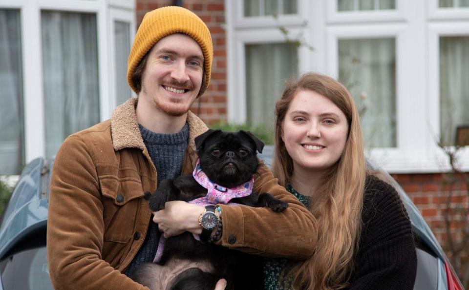 Daniel and Gina say they only bought a car because it makes it easier to travel with their pet pooch Mabel - Justin Grant