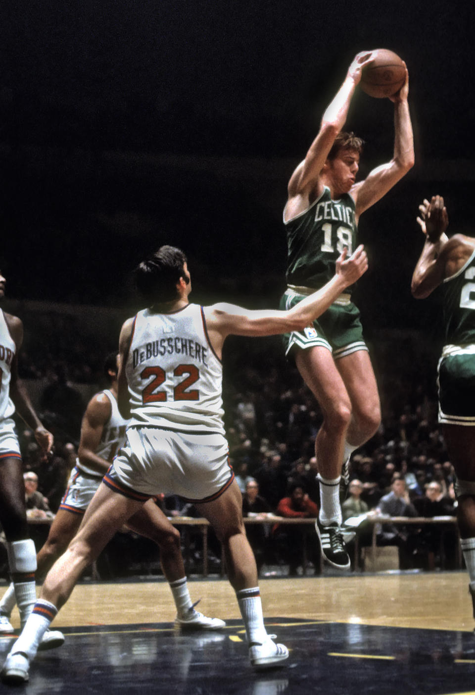 Unknown date 1970; New York, NY, USA; Boston Celtics center Dave Cowens (18) grabs a rebound over <a class="link " href="https://sports.yahoo.com/nba/teams/new-york/" data-i13n="sec:content-canvas;subsec:anchor_text;elm:context_link" data-ylk="slk:New York Knicks;sec:content-canvas;subsec:anchor_text;elm:context_link;itc:0">New York Knicks</a> forward Dave DeBusschere (22) at Madison Square Garden. Manny Rubio-USA TODAY Sports