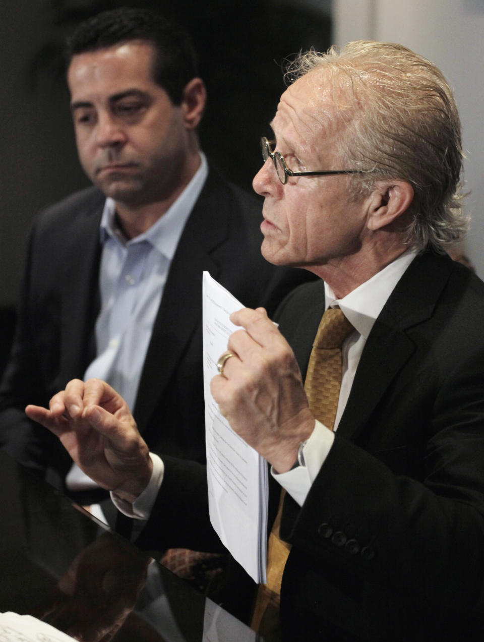 FILE - In this May 11, 2011 file photo, attorney Jeff Anderson speaks at a news conference Wednesday, May 11, 2011, in Chicago about a lawsuit he filed suing the Vatican on behalf of a woman whose son was sexually abused by Chicago priest Father Daniel McCormack. Looking on is attorney Marc Pearlman. The Archdiocese of Chicago on Wednesday, Jan. 15, 2014, will hand over thousands of pages of documents involving clergy sex abuse to victims’ attorneys, who plan to make them public next week as part of a years-long attempt to hold the Church accountable for its handling of abuse allegations. (AP Photo/M. Spencer Green, File)