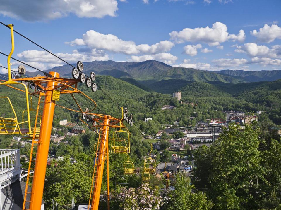 <p>A small mountain town in eastern Tennessee, Gatlinburg is super scenic and perfect for nature-lovers. It's located right alongside the Great Smoky Mountains National Park, making it the perfect stop before or after some hiking. Be sure to check out the <a href="https://www.gatlinburgspaceneedle.com/" rel="nofollow noopener" target="_blank" data-ylk="slk:Space Needle observation tower;elm:context_link;itc:0;sec:content-canvas" class="link ">Space Needle observation tower</a> and the <a href="https://www.gatlinburgskylift.com/" rel="nofollow noopener" target="_blank" data-ylk="slk:Sky Lift;elm:context_link;itc:0;sec:content-canvas" class="link ">Sky Lift</a>, an aerial cable car, for some gorgeous views. </p>