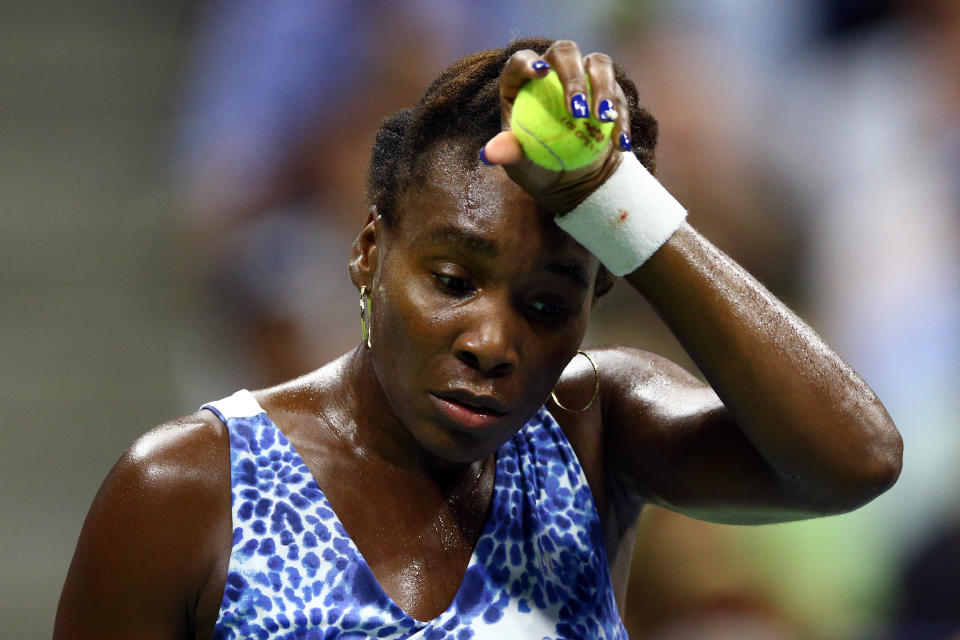 NEW YORK, NY - SEPTEMBER 08:  Venus Williams of the United States reacts against Serena Williams of the United States during their Women's Singles Quarterfinals match on Day Nine of the 2015 US Open at the USTA Billie Jean King National Tennis Center on September 8, 2015 in the Flushing neighborhood of the Queens borough of New York City.  (Photo by Clive Brunskill/Getty Images)