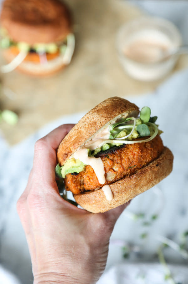 <strong>Get the <a href="https://feedmephoebe.com/cauliflower-sweet-potato-burgers-avocado-sriracha-aioli-vegetarian-paleo/" target="_blank">Cauliflower Sweet Potato Burgers</a> recipe from Feed Me Phoebe</strong>