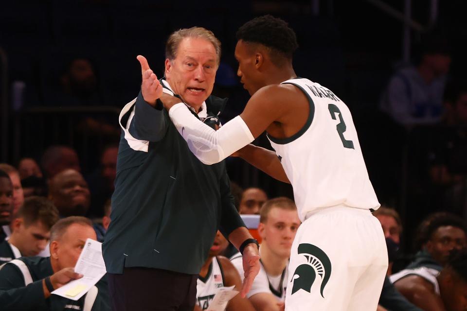 Head coach Tom Izzo of the Michigan State Spartans speaks with Tyson Walker #2 during the game against the Kansas Jayhawks during the State Farm Champions Classic at Madison Square Garden on November 09, 2021 in New York City.