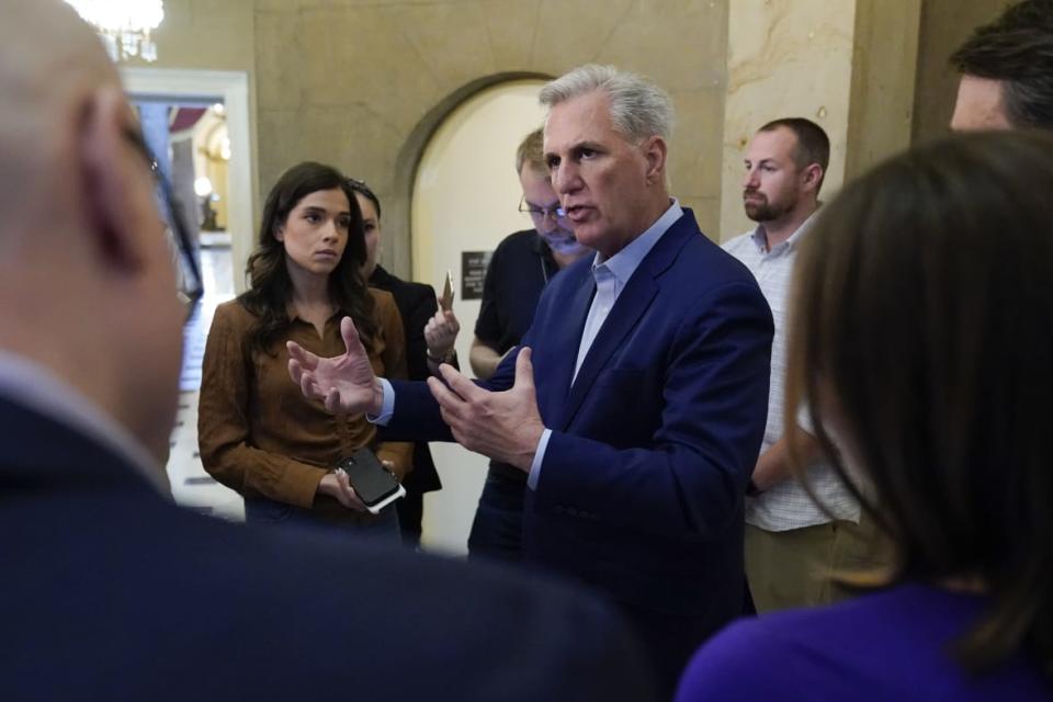 Speaker of the House Kevin McCarthy, R-Calif., speaks with members of the press after participating in a phone call on the debt ceiling with President Joe Biden, Sunday, May 21, 2023, on Capitol Hill in Washington. (AP Photo/Patrick Semansky)