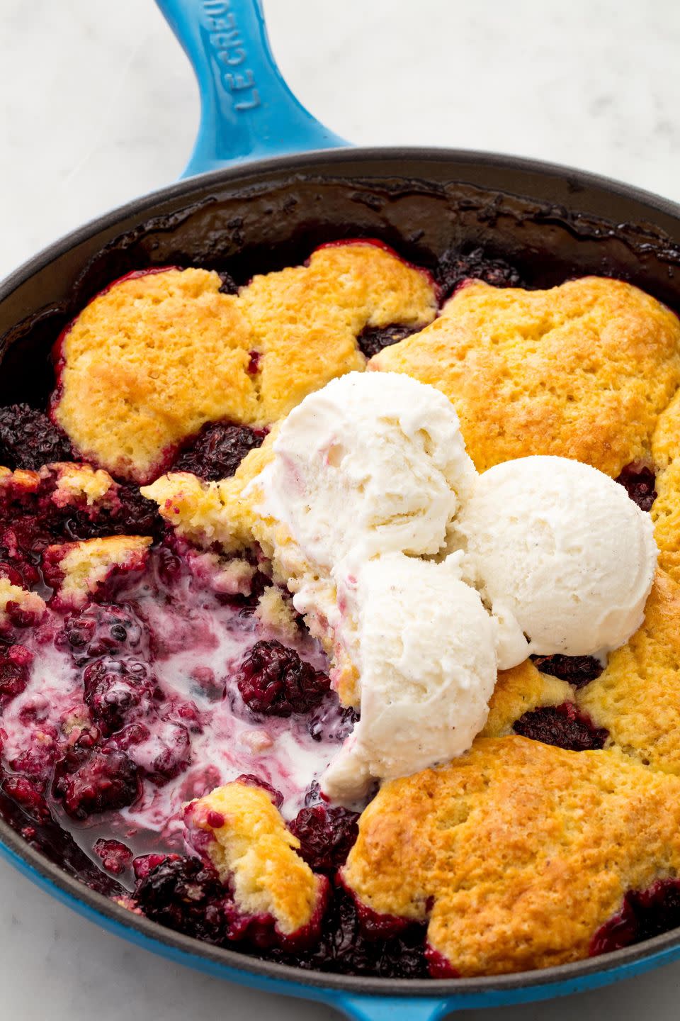<p>Don't forget the ice cream!</p><p>Get the recipe from <a href="https://www.delish.com/cooking/recipe-ideas/recipes/a58385/easy-blackberry-cobbler-recipe/" rel="nofollow noopener" target="_blank" data-ylk="slk:Delish" class="link ">Delish</a>. </p>