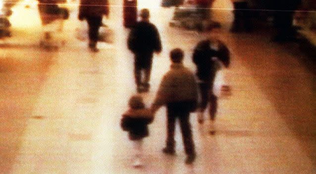 A surveillance camera shows the abduction of two-year-old James Bulger from the Bootle Strand shopping mall in 1993. Photo: Getty.