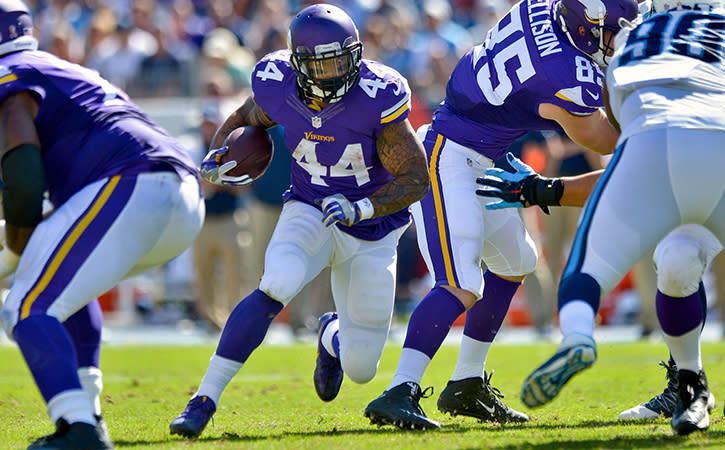 Sep 11, 2016; Nashville, TN, USA; Minnesota Vikings running back Matt Asiata (44) rushes against the Tennessee Titans during the second half at Nissan Stadium. Minnesota won 25-16.