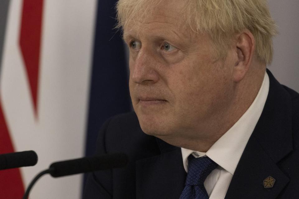 Prime Minister Boris Johnson faced criticism from opponents and party grandees back in the UK (Dan Kitwood/PA) (PA Wire)