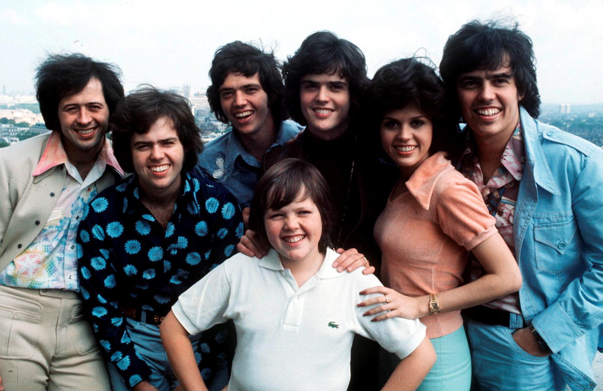 Wayne Osmond, Merrill Osmond, Jay Osmond, Jimmy Osmond, Donny Osmond, Marie Osmond and Alan Osmond (Photo: Michael Putland/Getty Images)