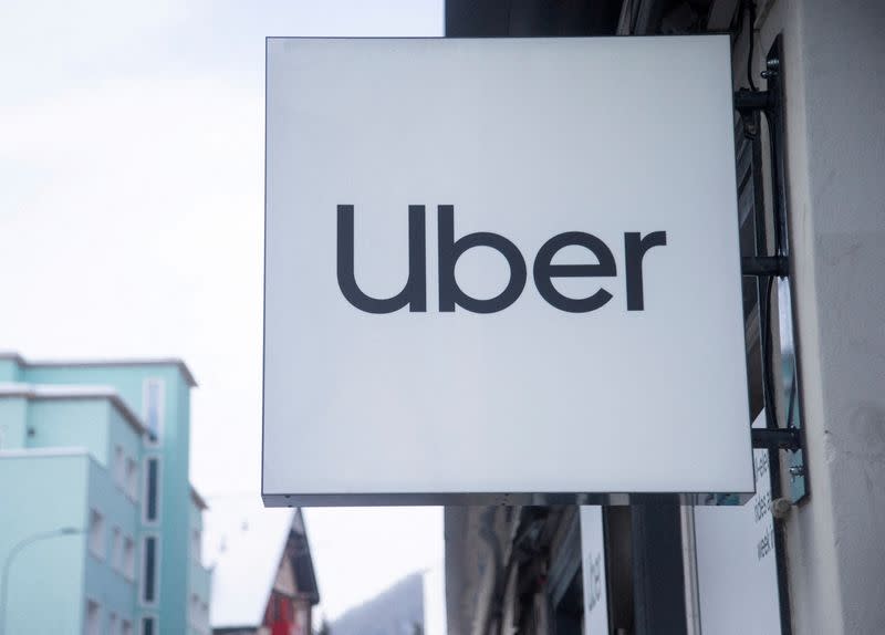 FILE PHOTO: Logo of Uber is seen at a temporary showroom during the World Economic Forum in Davos