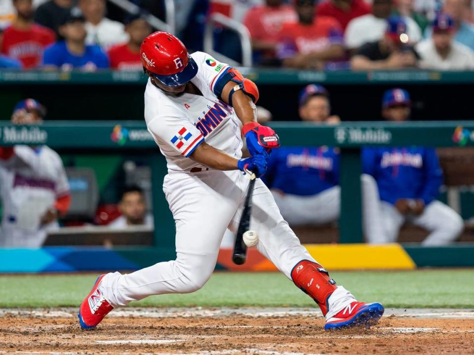 Dominican Republic infielder Jean Segura (2) hits a ground-rule double on a line drive to right-center field against Israel during the seventh inning of a Pool D game at the World Baseball Classic at loanDepot Park on Tuesday, March 14, 2023, in Miami, Fla.