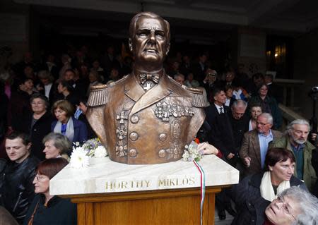 Right-wing nationalists attend a ceremonial unveiling the statue of wartime leader Miklos Horthy in central Budapest November 3,2013. REUTERS/Laszlo Balogh