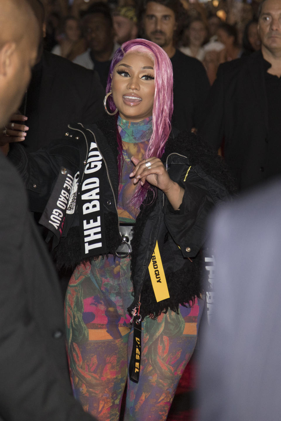 Nicki Minaj with pink and purple hair.