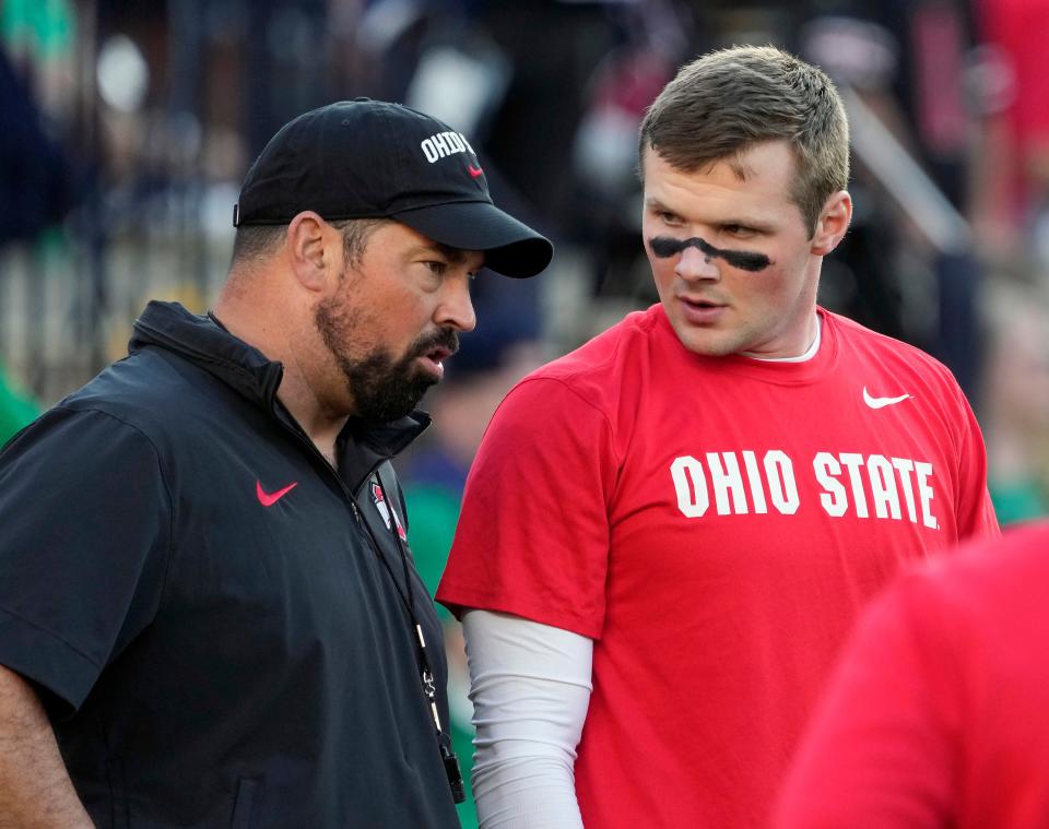 Sep 23, 2023; South Bend, Indiana, USA; Ohio State Buckeyes head coach Ryan Day talks to quarterback Kyle McCord (6) during warm-ups before their game against Notre Dame Fighting Irish at Notre Dame Stadium.