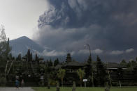 <p>Foreign tourists take pictures as Mount Agung erupts at Besakih Temple in Karangasem, Bali, Indonesia on Nov. 26, 2017. (Photo: Johannes P. Christo/Reuters) </p>