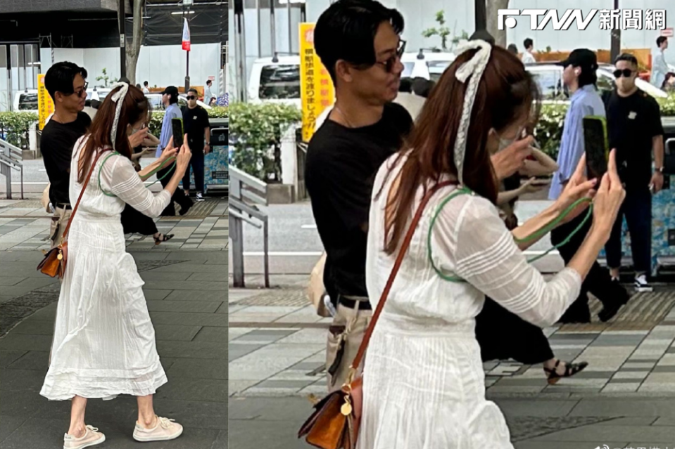 網友拍下林志玲和AKIRA在東京街頭約會，稱讚穿一身白洋裝的林志玲像仙女一樣。（圖／翻攝微博）