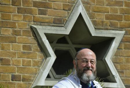 Chief rabbi-designate, Ephraim Mirvis, waits for Prince Charles to arrive to attend his installation as chief rabbi, at St John's Wood Synagogue in London September 1, 2013. REUTERS/Toby Melville