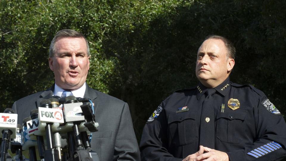 Special Agent in Charge Michael McPherson (left) of the FBI Tampa office announces that personal items belonging to Brian Laundrie have been found at the Myakkahatchee Creek Environmental Park on October 20, 2021, in North Port, Florida.