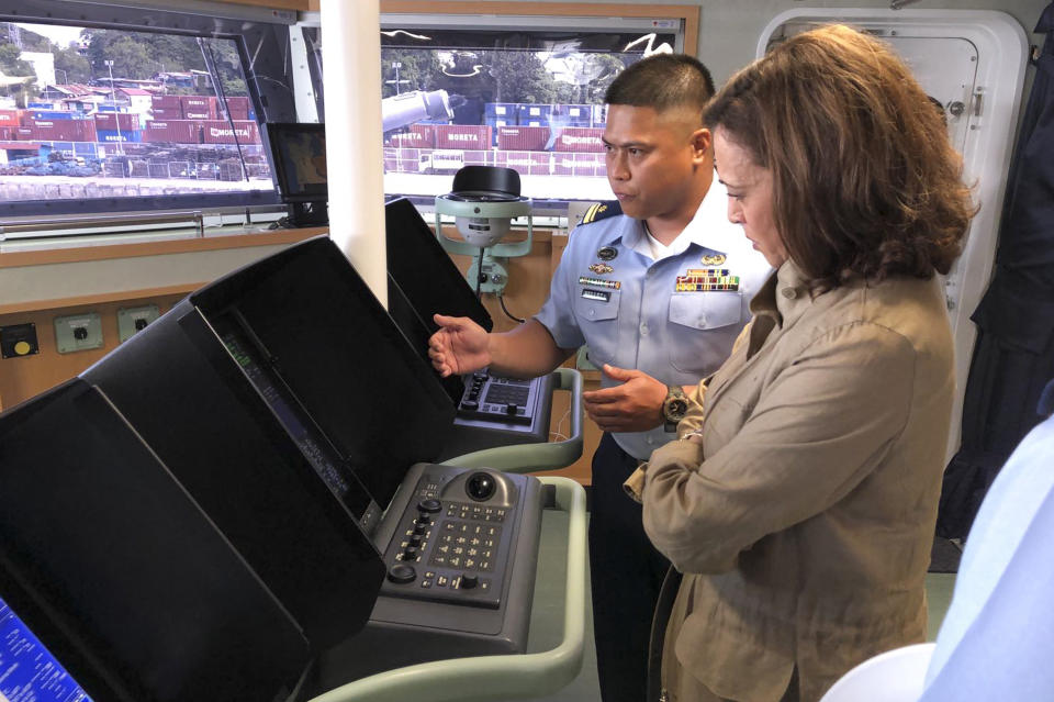 In this photo provided by the Philippine Coast Guard, U.S. Vice President Kamala Harris, right, is given a tour on board the Philippine Coast Guard BRP Teresa Magbanua (MRRV-9701) during her visit to Puerto Princesa, Palawan province, western Philippines on Tuesday, Nov. 22, 2022. Harris visited a western Philippines island province at the edge of the South China Sea on Tuesday to amplify America's support to its treaty ally and underline U.S. interest in freedom of navigation in the disputed waters, where it has repeatedly chastised China for belligerent actions. (Philippine Coast Guard via AP)