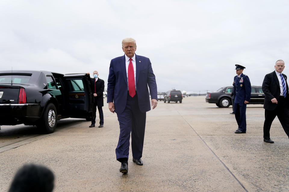 President Donald Trump walks towards the media to speak before boarding Air Force One for a trip to Kenosha, Wis., Tuesday, Sept. 1, 2020, in Andrews Air Force Base, Md. (AP Photo/Evan Vucci)